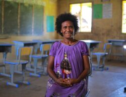 One of 1,104 Solar Champions trained by the Pawa Bilong Kirapim Raikos project to maintain the solar systems in the years ahead