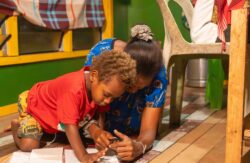 With solar energy lighting up their homes, children in Huon Gulf District can study whenever they want, for as long as they want